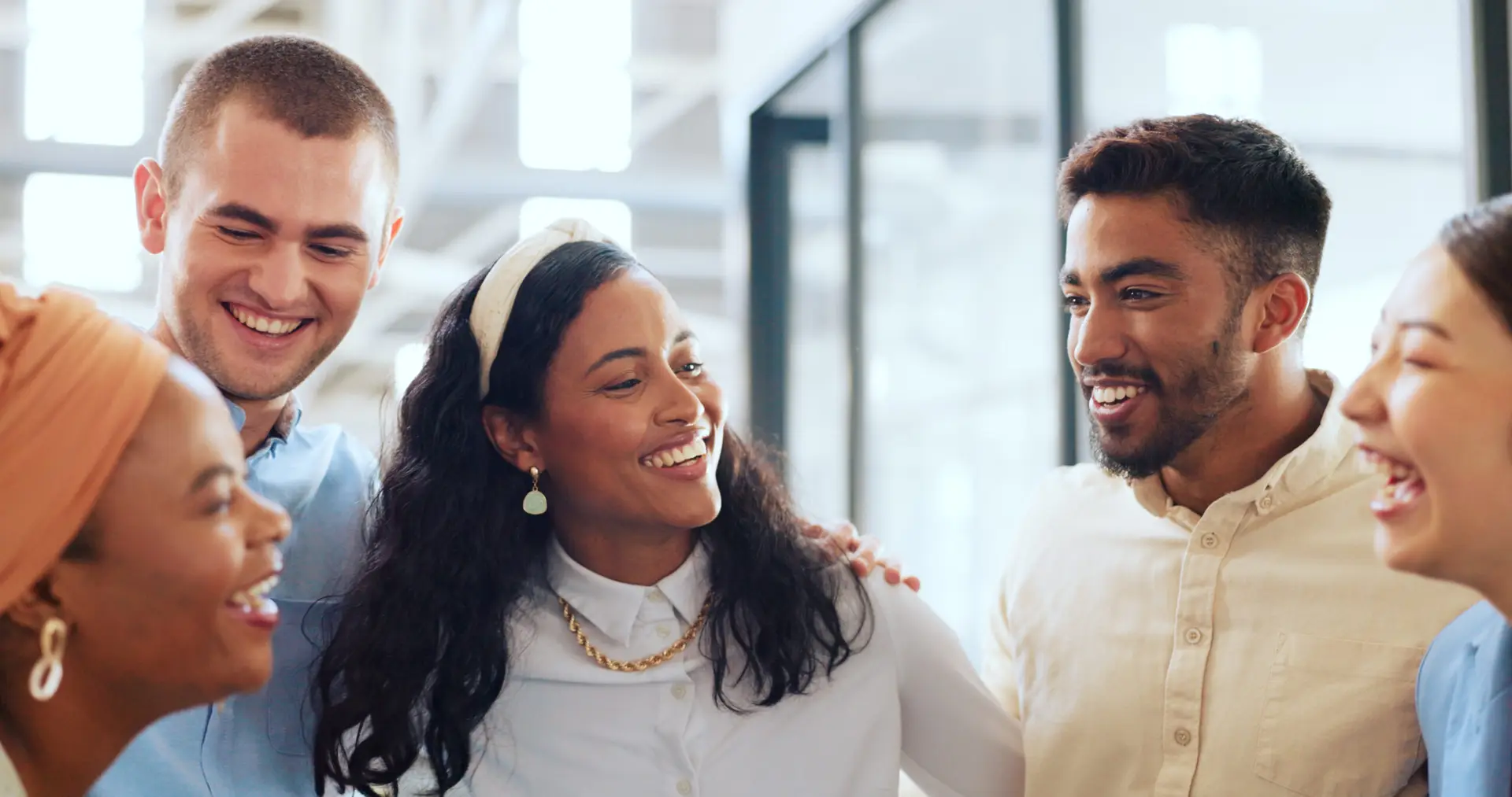 Diverse team of professionals collaborating in a modern office